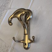 Hook for towels and robes. Antique brass, restored for the bathroom. Italy.